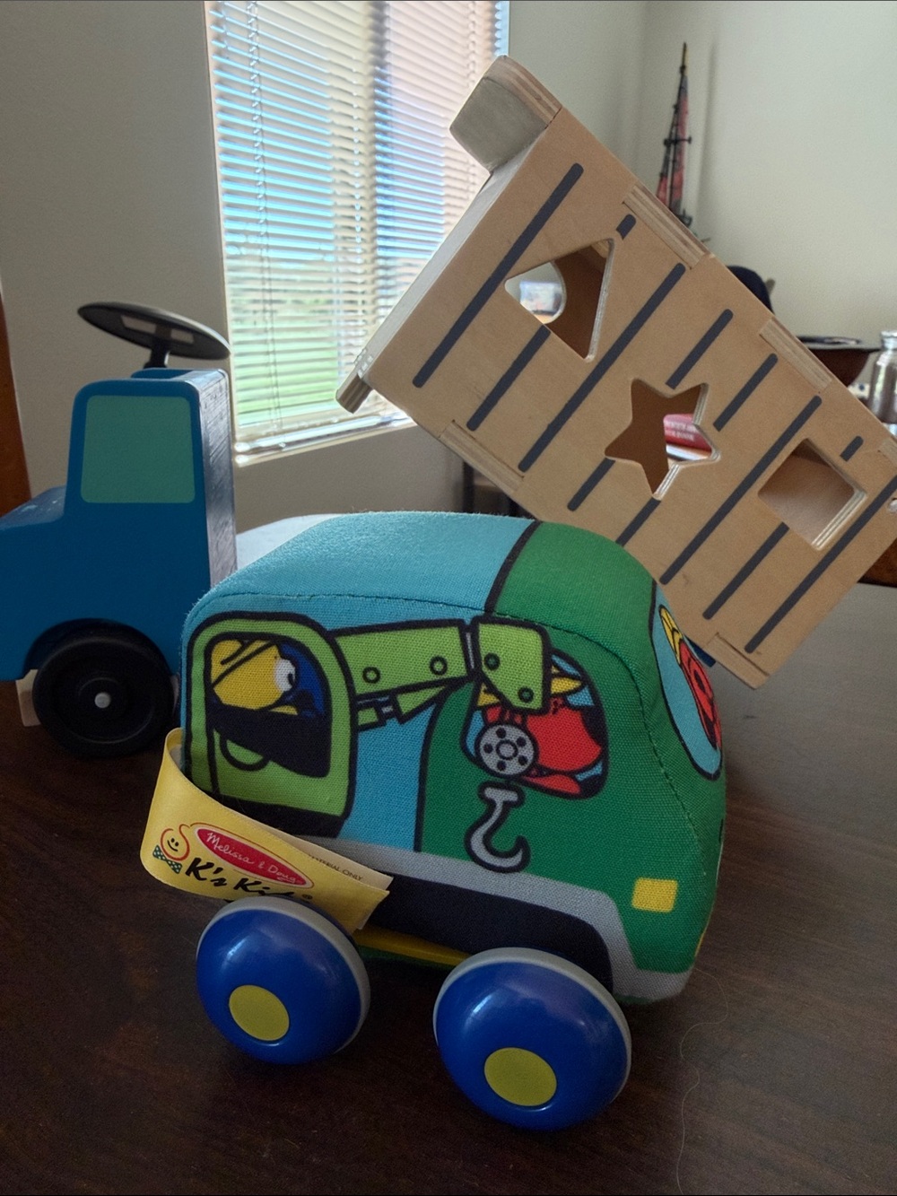 Melissa & Doug Wooden Shape-Sorting Dump Truck & K's Kids Soft Crane Toy Lot